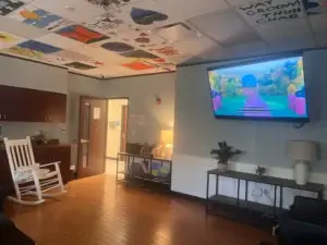 therapy room with client artwork door entrance view